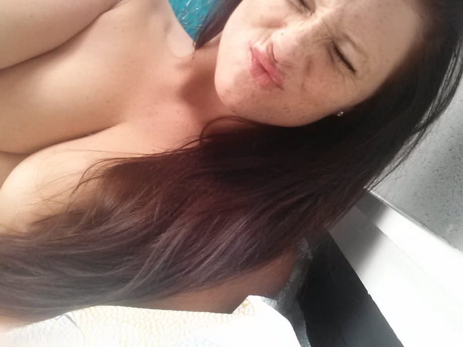 Self shot of brunette amateur Freckles showing cameltoe in sheer panties