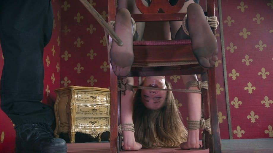 Solo girl Ashley Lane is rendered helpless during bondage play