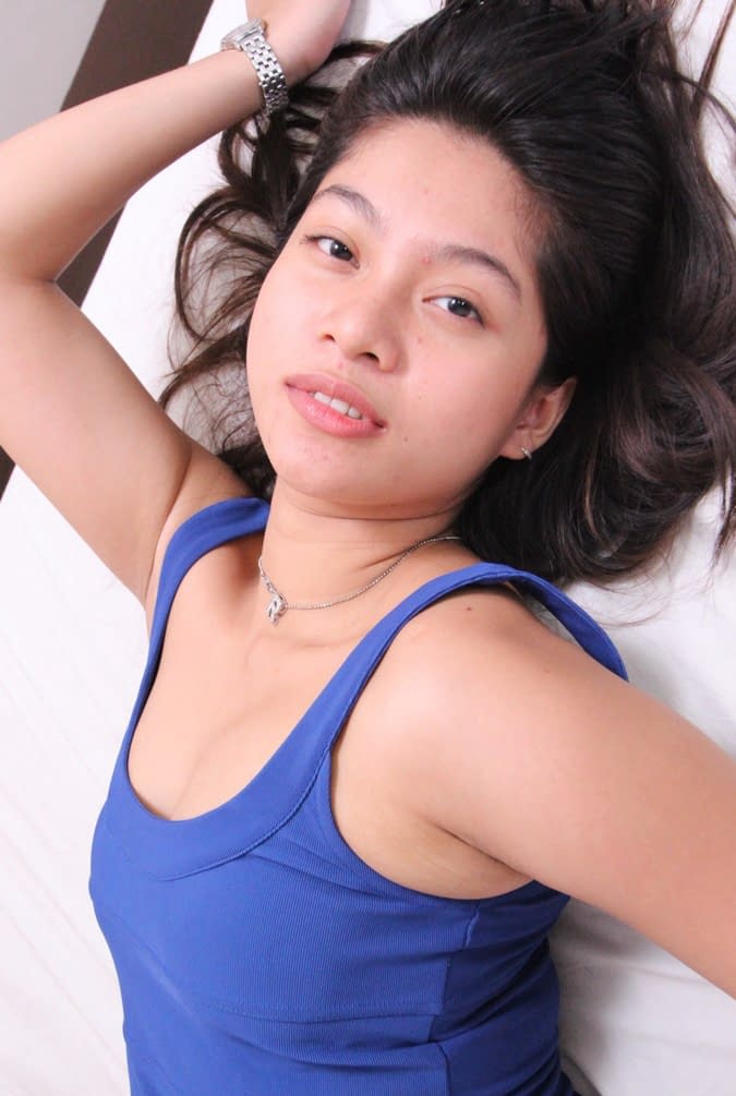 Filipino girl takes off her dress and lingerie to pose nude for the first time