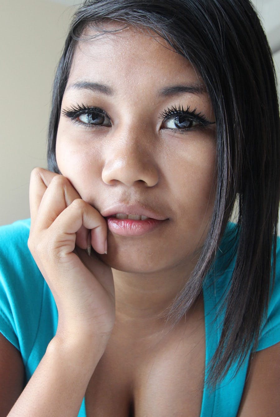 Beautiful Asian with huge dark nipples rubbing her smooth shaved pussy