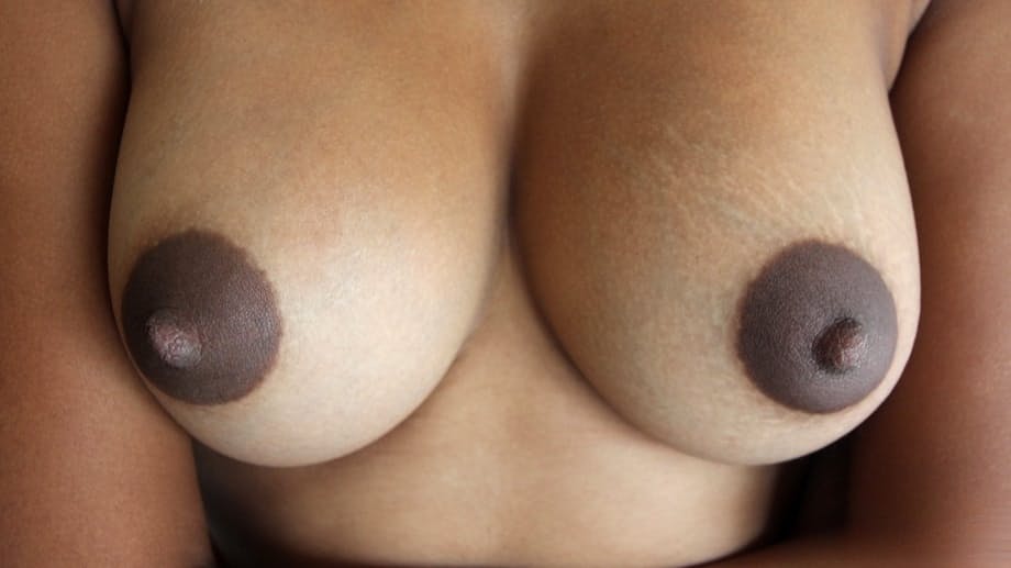 Beautiful Asian with huge dark nipples rubbing her smooth shaved pussy