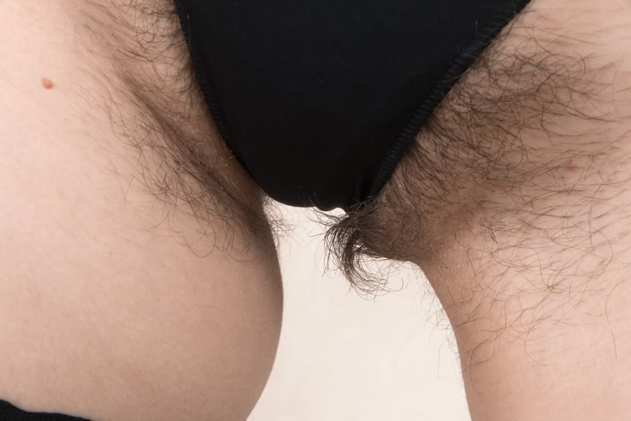 Sweet teen amateur Slava Sanina strips naked for viewing of hairy vagina