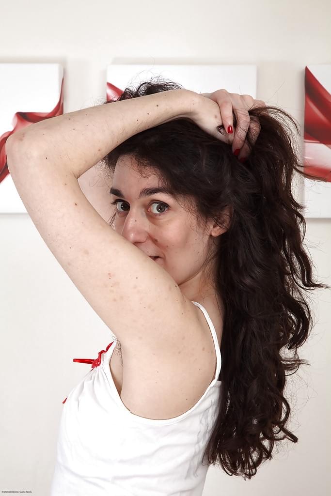 Ugly hairy pussy by mature brunette with hairy armpits and tiny tits.