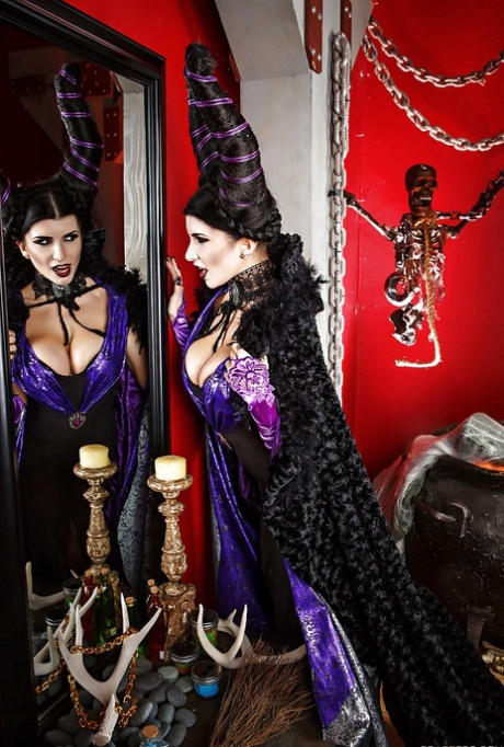 Milf pornstar Romi Rain showing off in her Halloween costume
