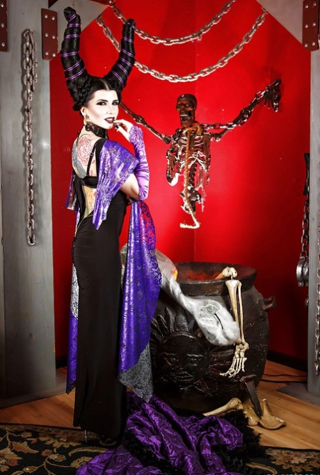 Milf pornstar Romi Rain showing off in her Halloween costume