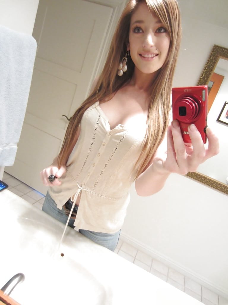 Tiny tit brunette Casana undressing in the bathroom to show herself