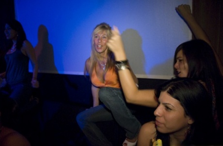 Gangbang party features crazy girls doing blowjobs and handjobs