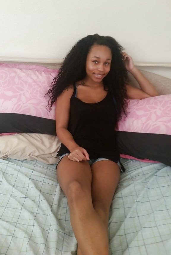 Young black teen Alana baring all natural black tits giving handjob