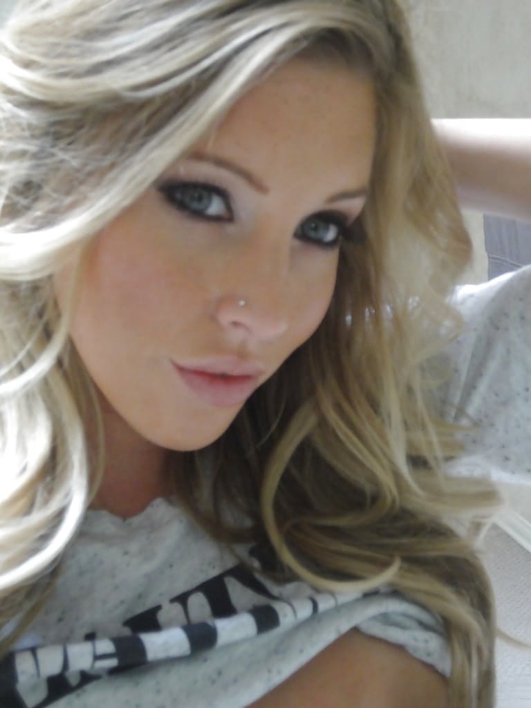 Young blonde Samantha Saint taking nude selfies in the bathroom