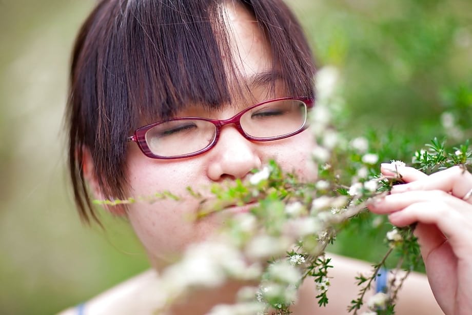 Hairy Asian amateur Gita slowly taking off her clothes outdoors