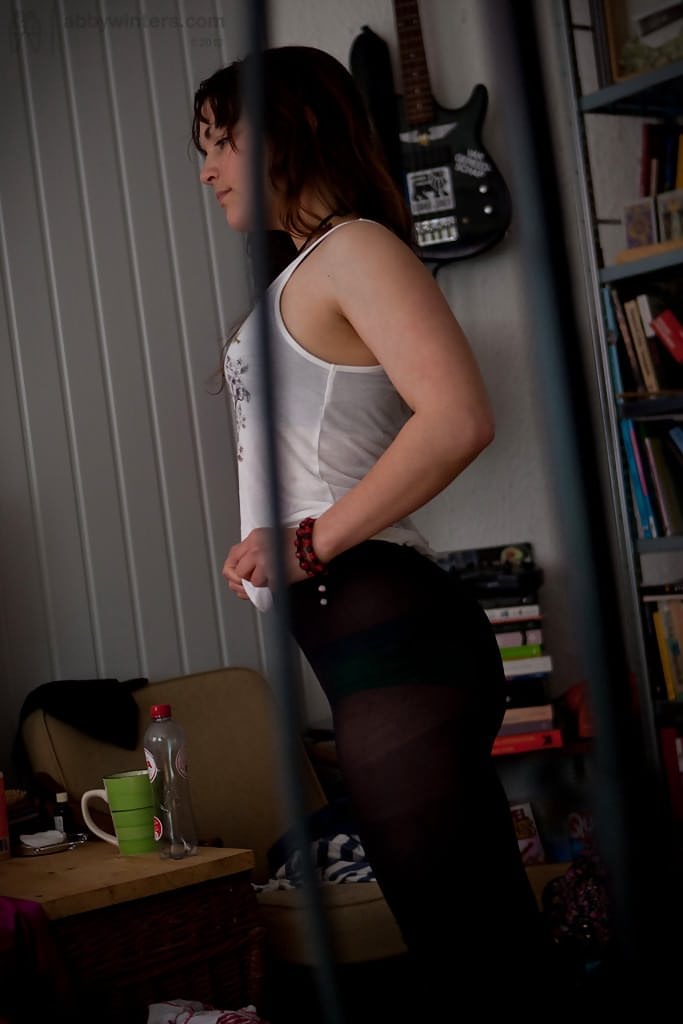 Naughty voyeur shots of young babe Bea getting dressed after nude modelling