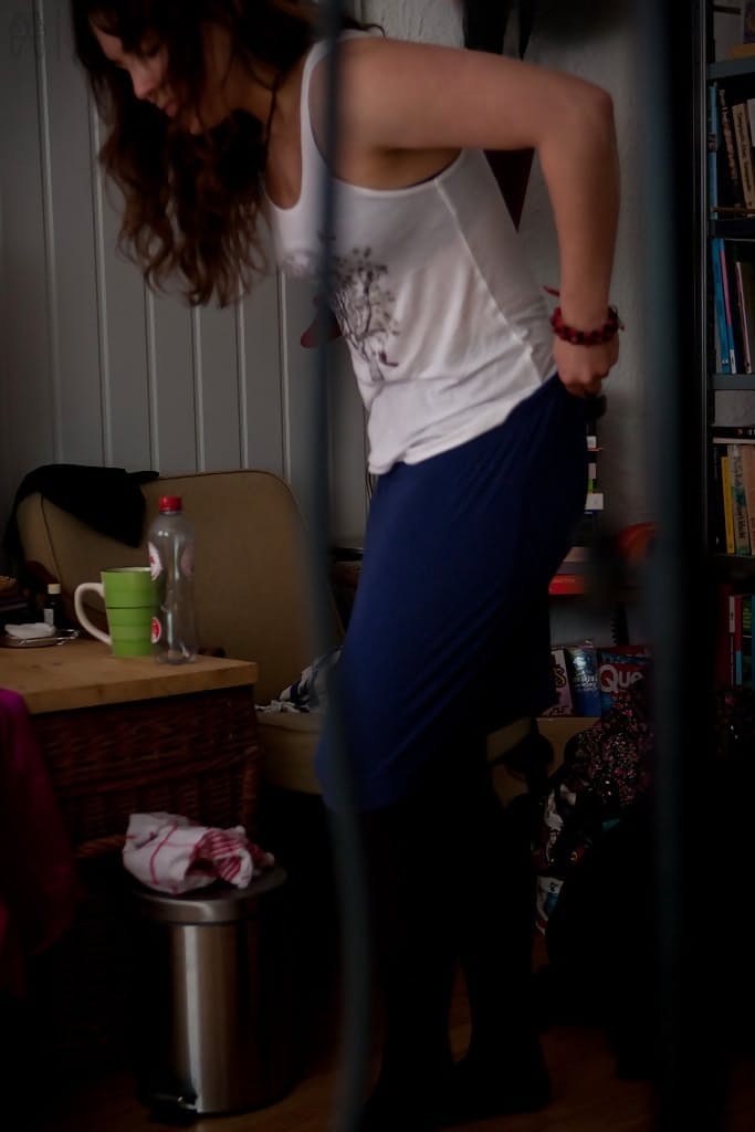 Naughty voyeur shots of young babe Bea getting dressed after nude modelling