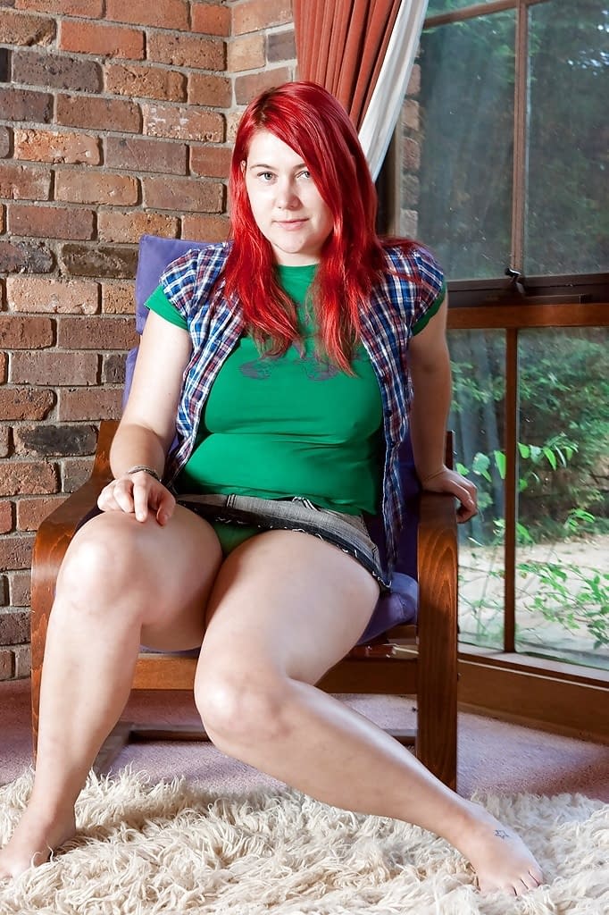 Chubby redhead teen Adalin shows off her puffy hairy pussy and fat butt