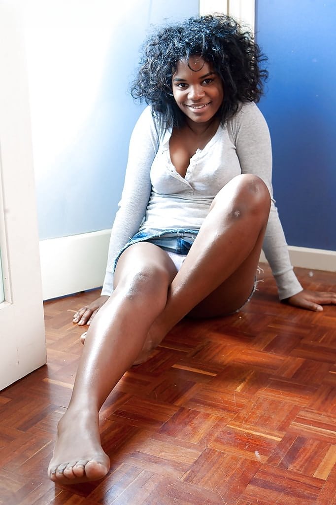 Ebony amateur Manuela removes denim skirt and panties for black cunt spread