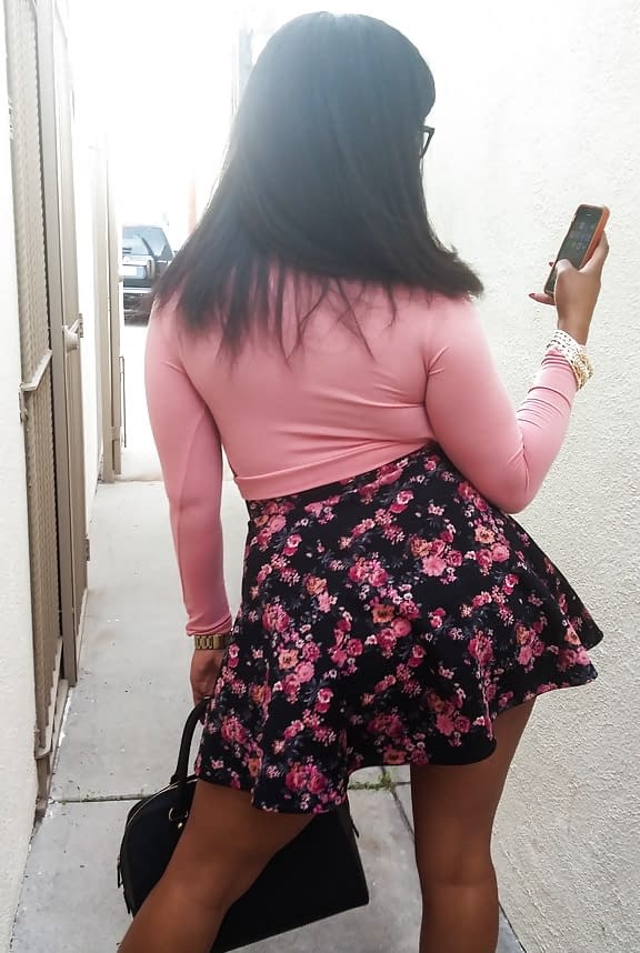 Busty black girl Porsha Carrera bends over in high heels for upskirt