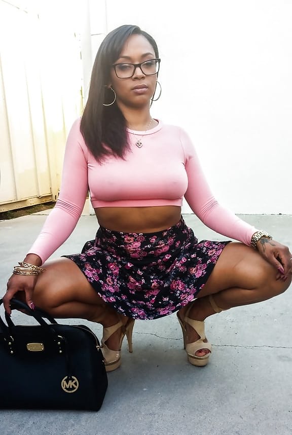 Busty ebony chick Porsha Carrera showing off her thong panties and phat ass