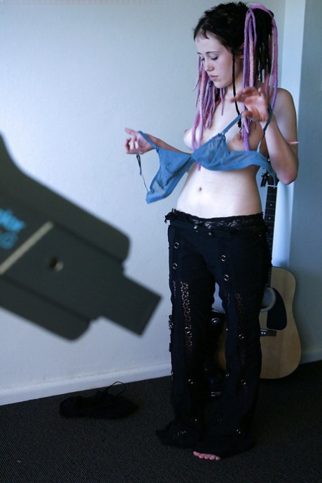 Young girl in dreadlocks recorded getting dressed by hidden spy camera
