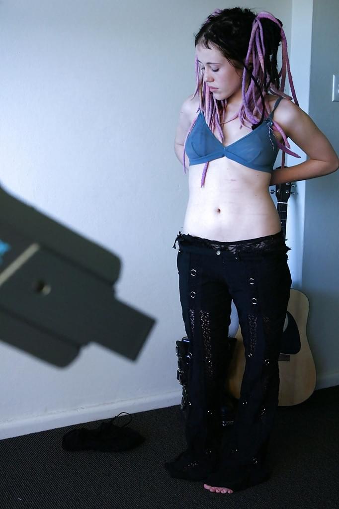 Young girl in dreadlocks recorded getting dressed by hidden spy camera