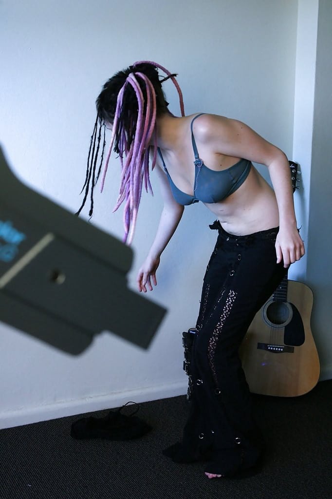 Young girl in dreadlocks recorded getting dressed by hidden spy camera