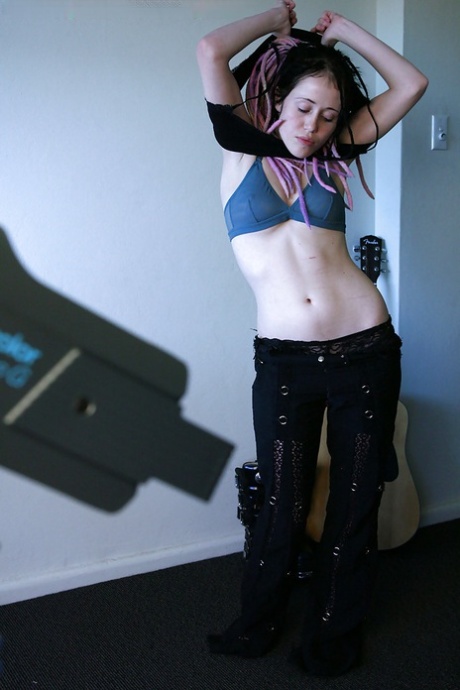 Young girl in dreadlocks recorded getting dressed by hidden spy camera