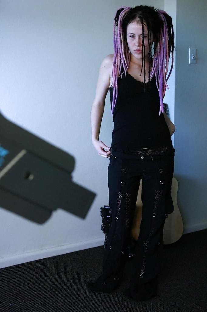 Young girl in dreadlocks recorded getting dressed by hidden spy camera