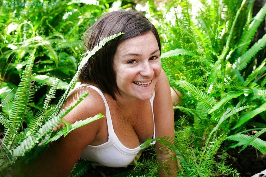 Chubby girl with freckles and big natural boobs spreads hairy cunt outside