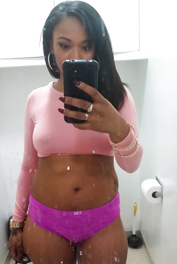 Curvy black chick Porsha Carrera taking selfies of her big black tits