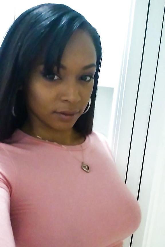 Curvy black chick Porsha Carrera taking selfies of her big black tits