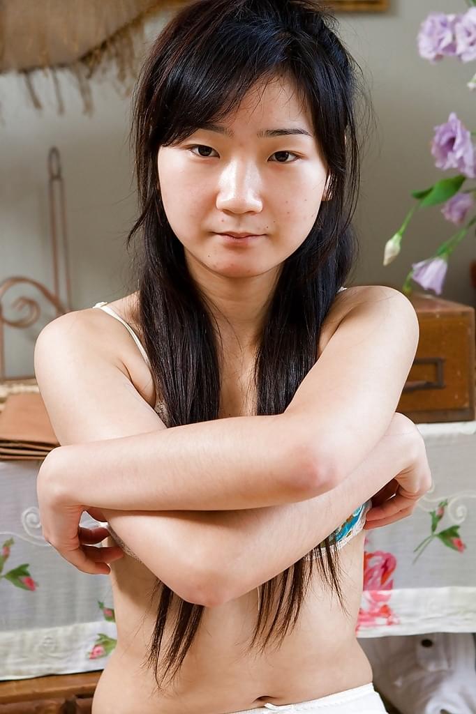 Cute small tit Asian amateur Oksana spreading her hairy twat