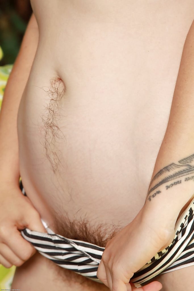 Ugly redhead woman Velma exposing her hirsute body outdoors