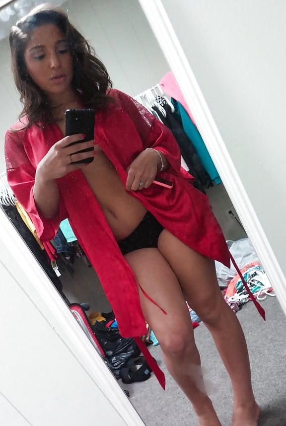 Self shots of busty teenager Abella Banger getting dressed