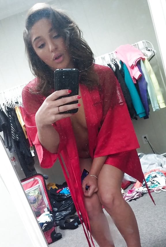 Self shots of busty teenager Abella Banger getting dressed