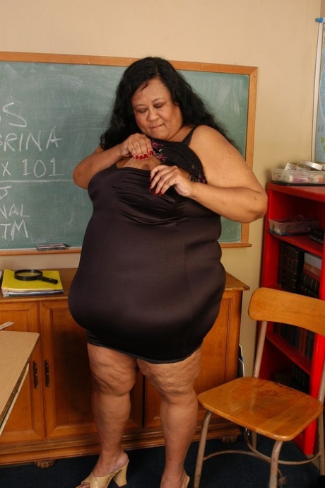 SSBBW Latina teacher Debrina baring incredible saggy boobs and fat rolls
