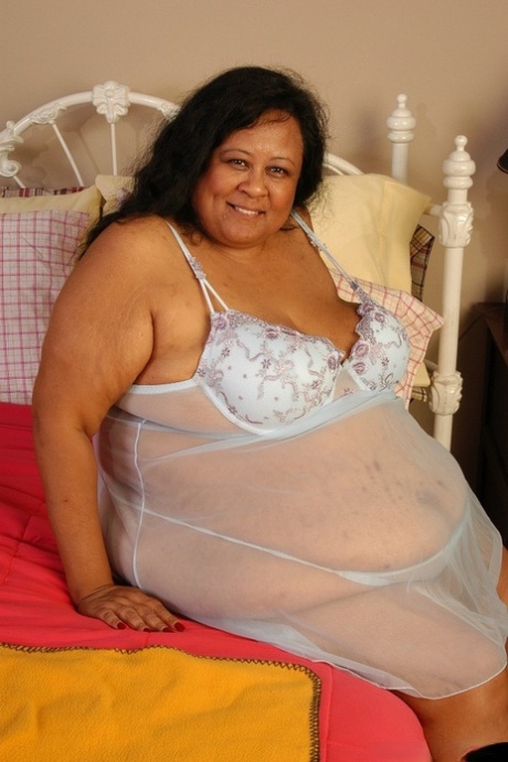 SSBBW Debrina lets fat tits loose from lingerie for nipple licking