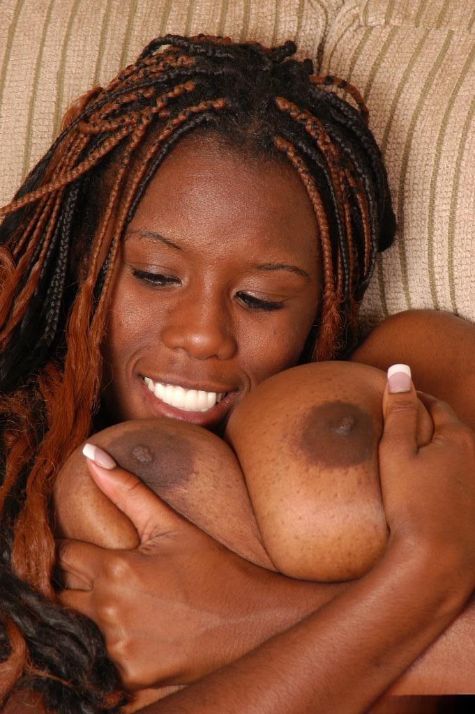 Chubby black woman Diva exposing her huge all natural black boobs