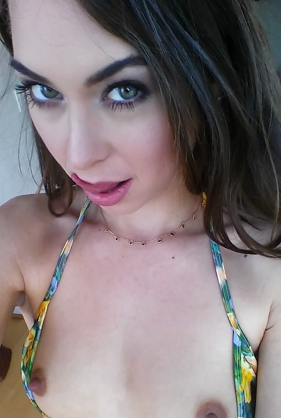 Petite chick Riley Reid taking nsfw selfies of shaved pussy outdoors