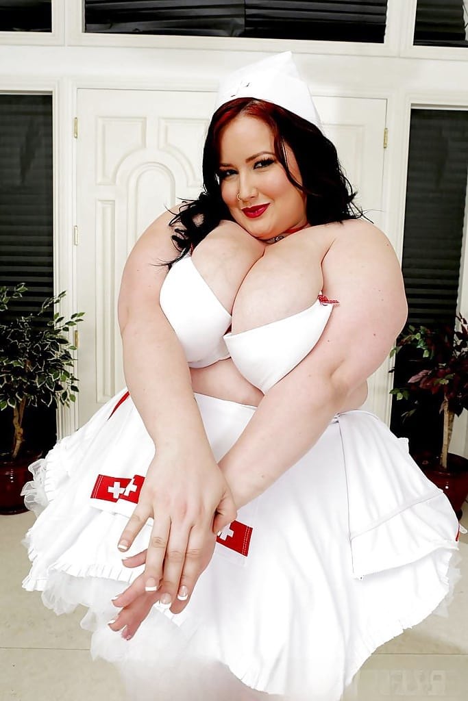 SSBBW Eliza nurse posing in heels and naughty nurse uniform
