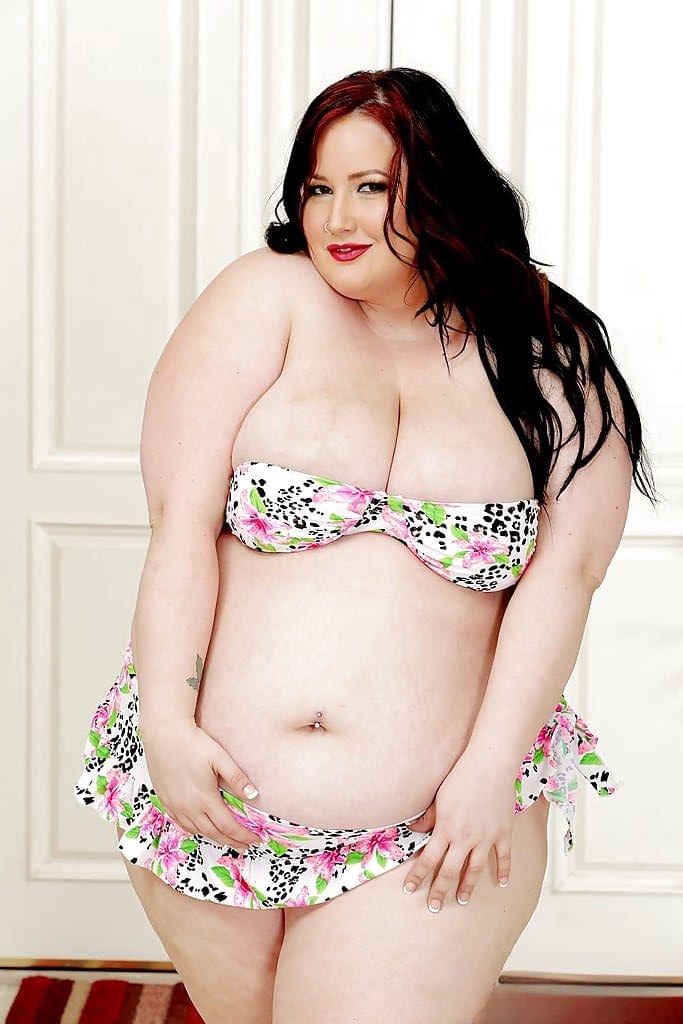 SSBBW Eliza nurse posing in heels and naughty nurse uniform