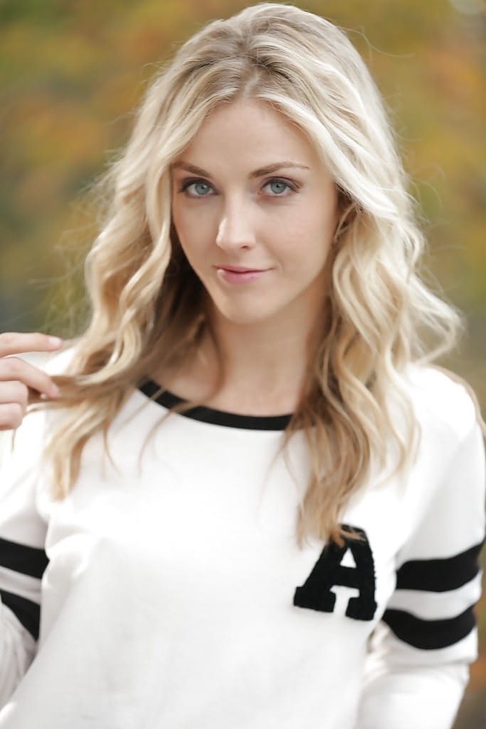 Blonde pornstar Karla Kush posing topless outdoors in schoolgirl uniform