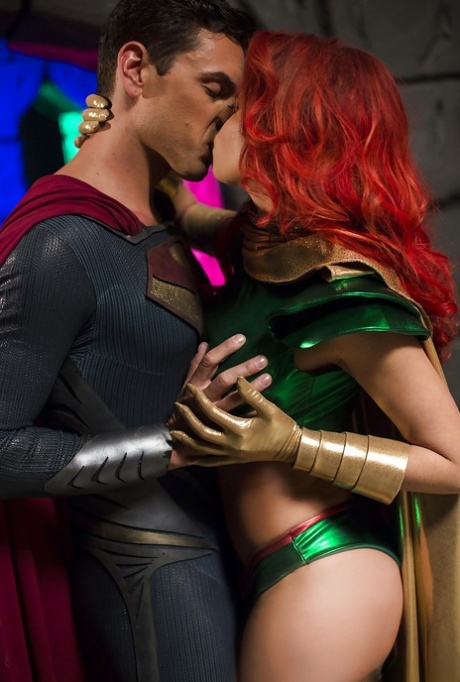 Chesty cosplay redhead Britney Amber taking a cumshot on her tongue