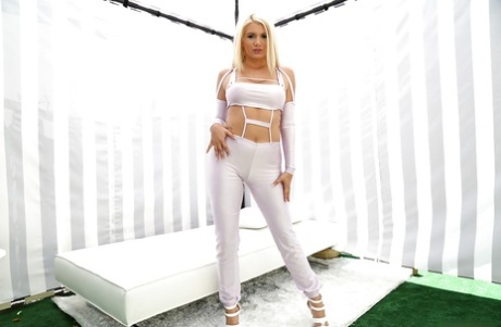 Blonde babe Layla Price shows off her perfect boobs outdoors
