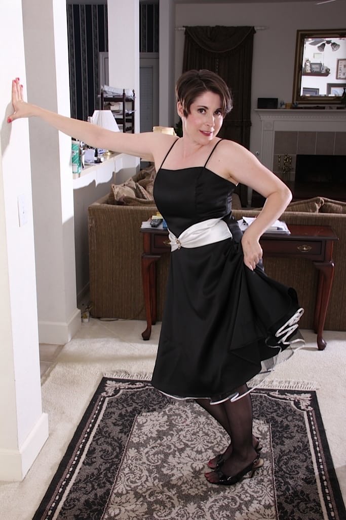 Mature lady Sadie Jones playing with her exposed all natural breasts