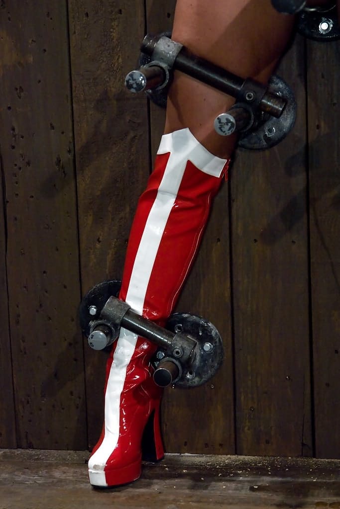 Christina Carter plays Wonder Woman during kinky Device Bondage porn shoot