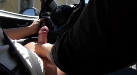 Amateur girlfriend Sissiemaus giving a handjob and blowjob in car