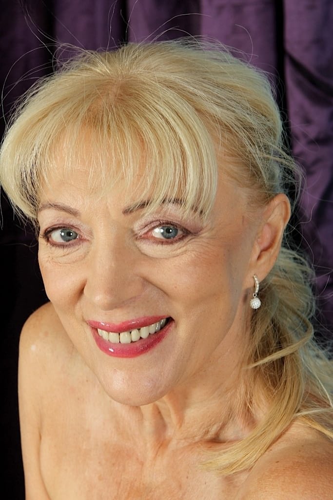Naughty granny Janet Lesley revealing saggy tits before spreading cooter