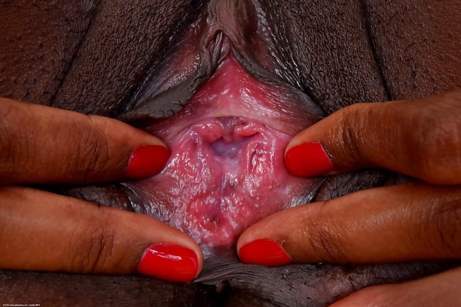 Older black lady unveils small breasts and long nipples while undressing