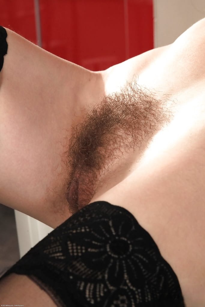 Nylon and skirt adorned MILF revealing hairy vagina in high heels