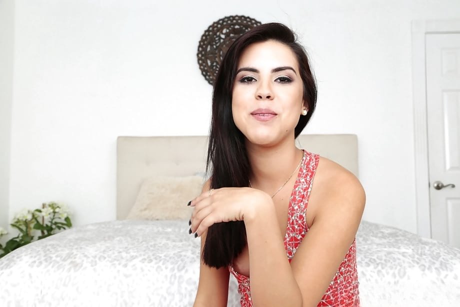 Petite amateur brunette Lilith Shayton revealing tiny tits while undressing