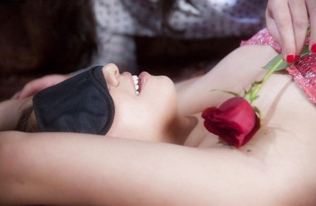 Asian pornstar Kobe Lee seducing a blindfolded Sara Luvv for lesbian sex