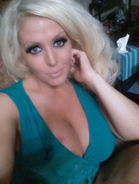 Platinum blonde bombshell Alura Jenson baring big tits for selfie